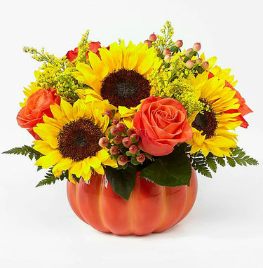 Halloween Pumpkin Floral Arrangement with Sunflowers, Orange Roses, and Red Hypericum